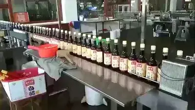 Aplicador de precintos de seguridad termoencogibles para botellas
