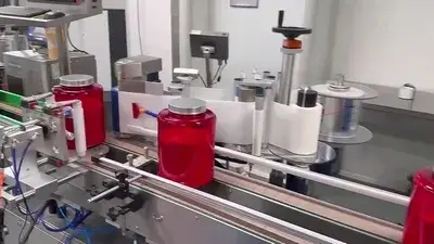 Etiquetadora envolvente para botellas grandes