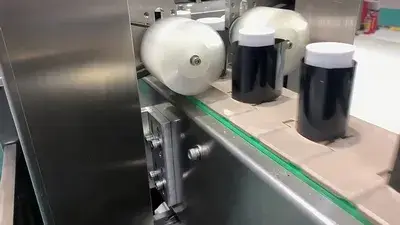 Aplicador de mangas termoencogibles de alta velocidad