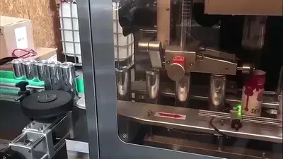 Aplicador de mangas termoencogibles para latas